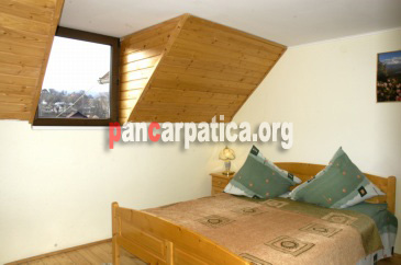 Imagine cu interiorul unui camere cu pat matrimonial din Vila Maria-Simon cu mobilier modern