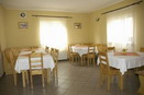Imagine cu restaurantul pensiunii Gabimar-Ciocanesti unde turistii pot servi feluri de mancare traditionale romanesti